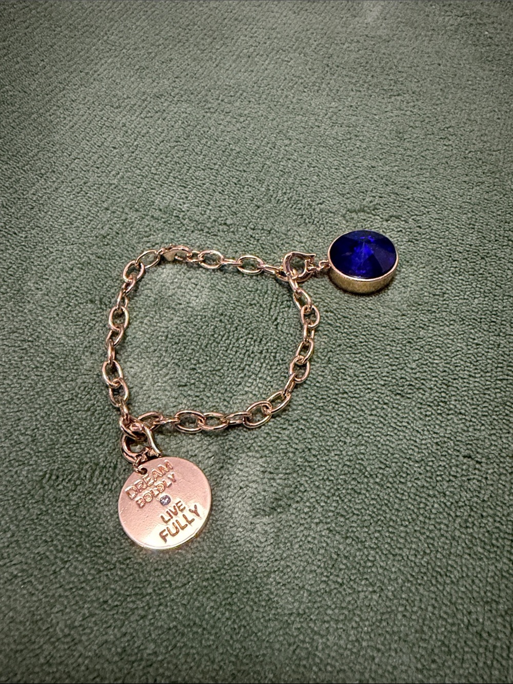 Gold KKG Charm Bracelet with Deep Blue Crystal Accent